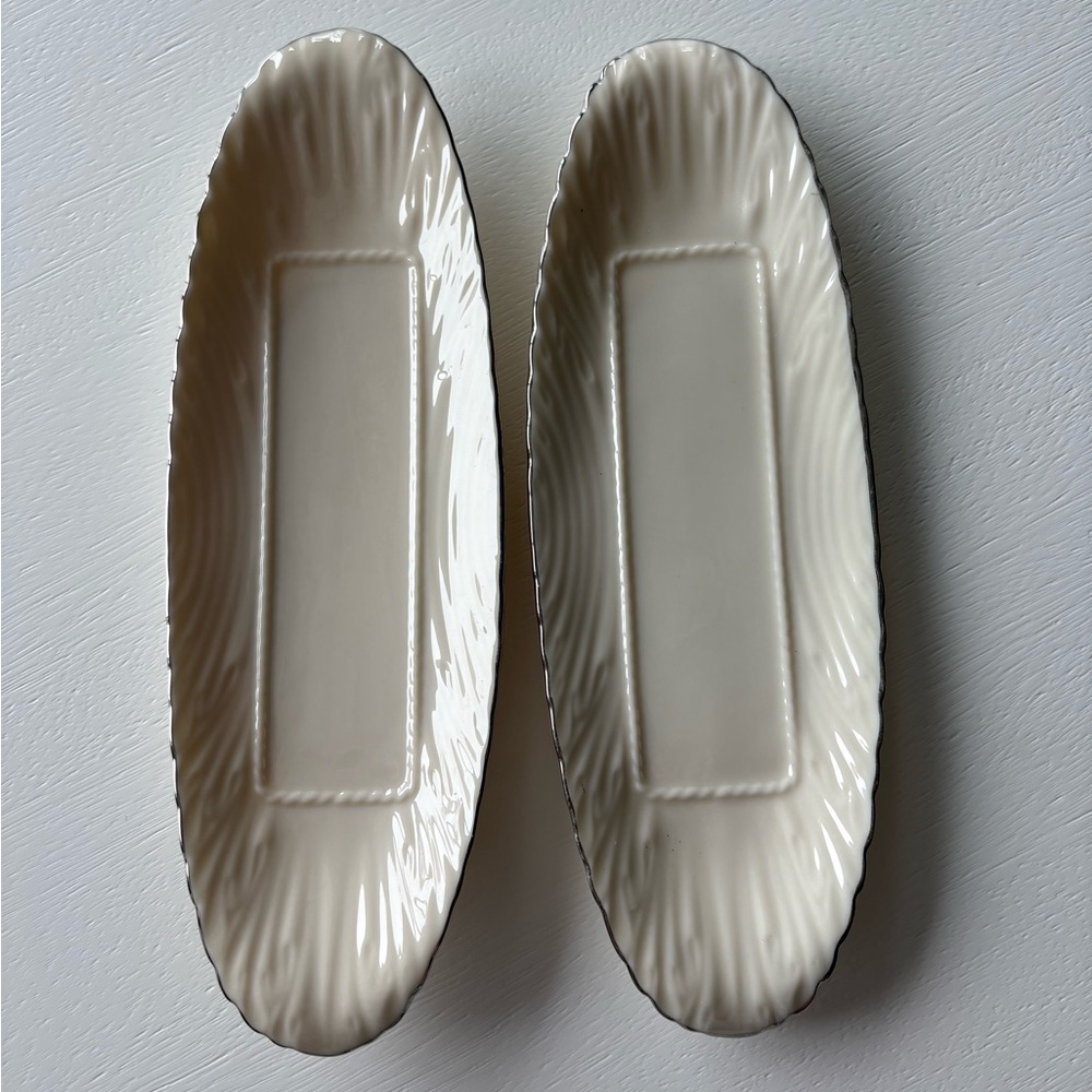 Two LENOX butter dishes with silver trim. With rope interior.